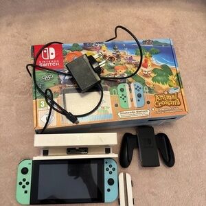 Nintendo Switch Console with Mint and Green Joy-Con